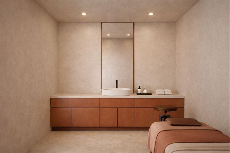 Single-bed facial room with terracotta joinery